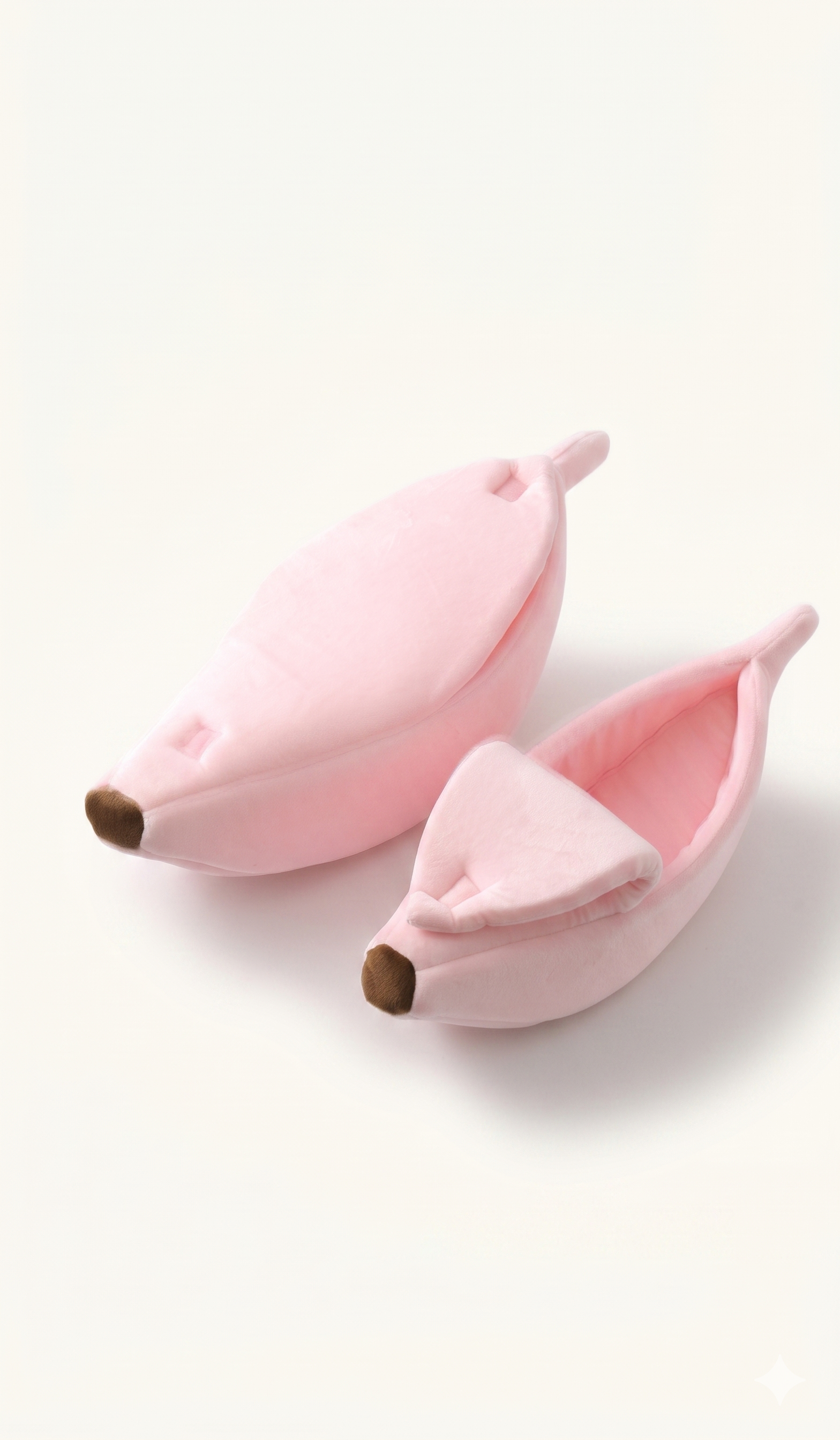 Banana-shaped bed in pink, small size for cats under 3 lbs