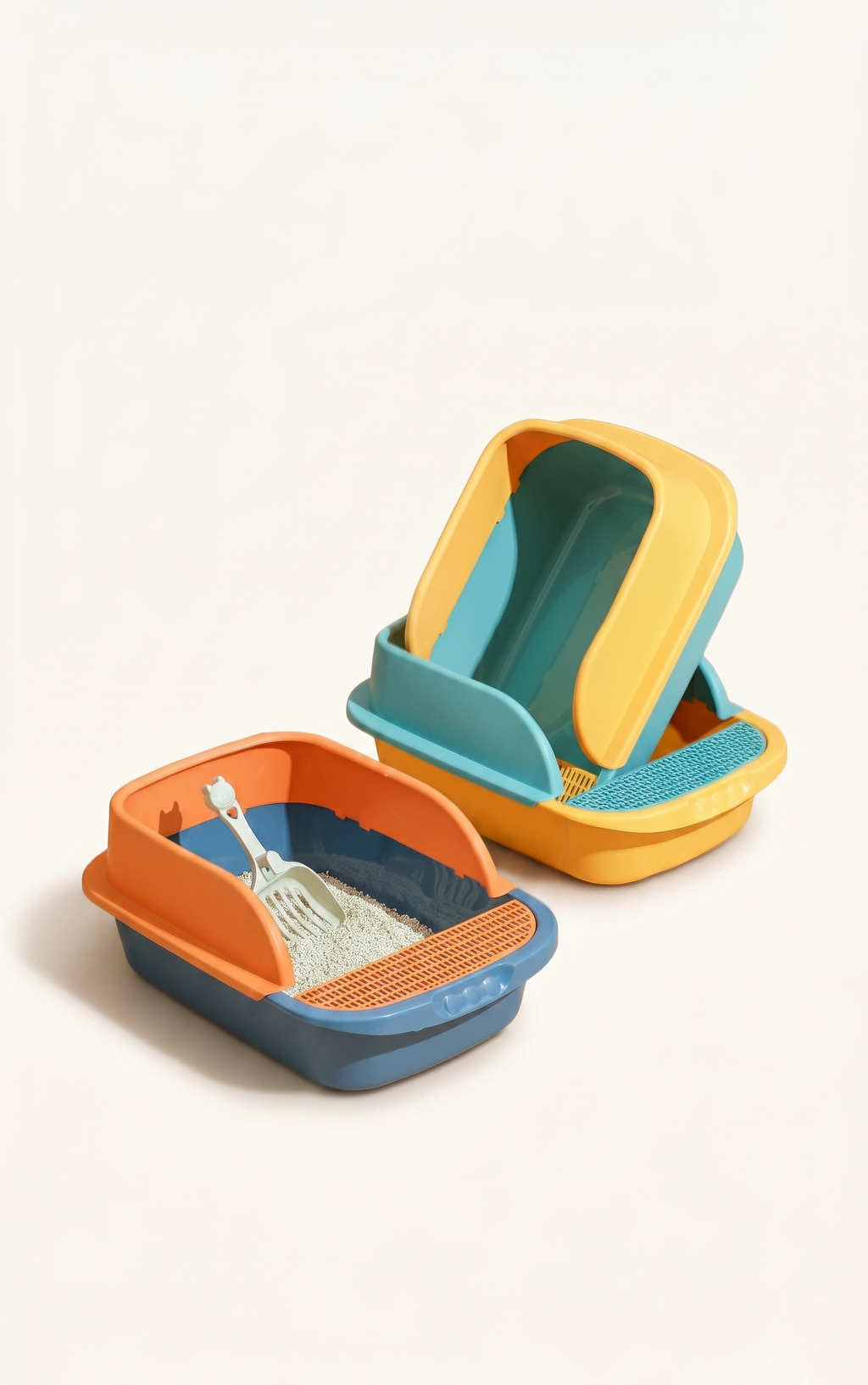 Colorful cat litter boxes in blue-and-orange and teal-and-yellow color variations, featuring high splash guards, front paw-cleaning sifting grids