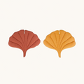 Reversible, two-toned gingko leaf-shaped mat.