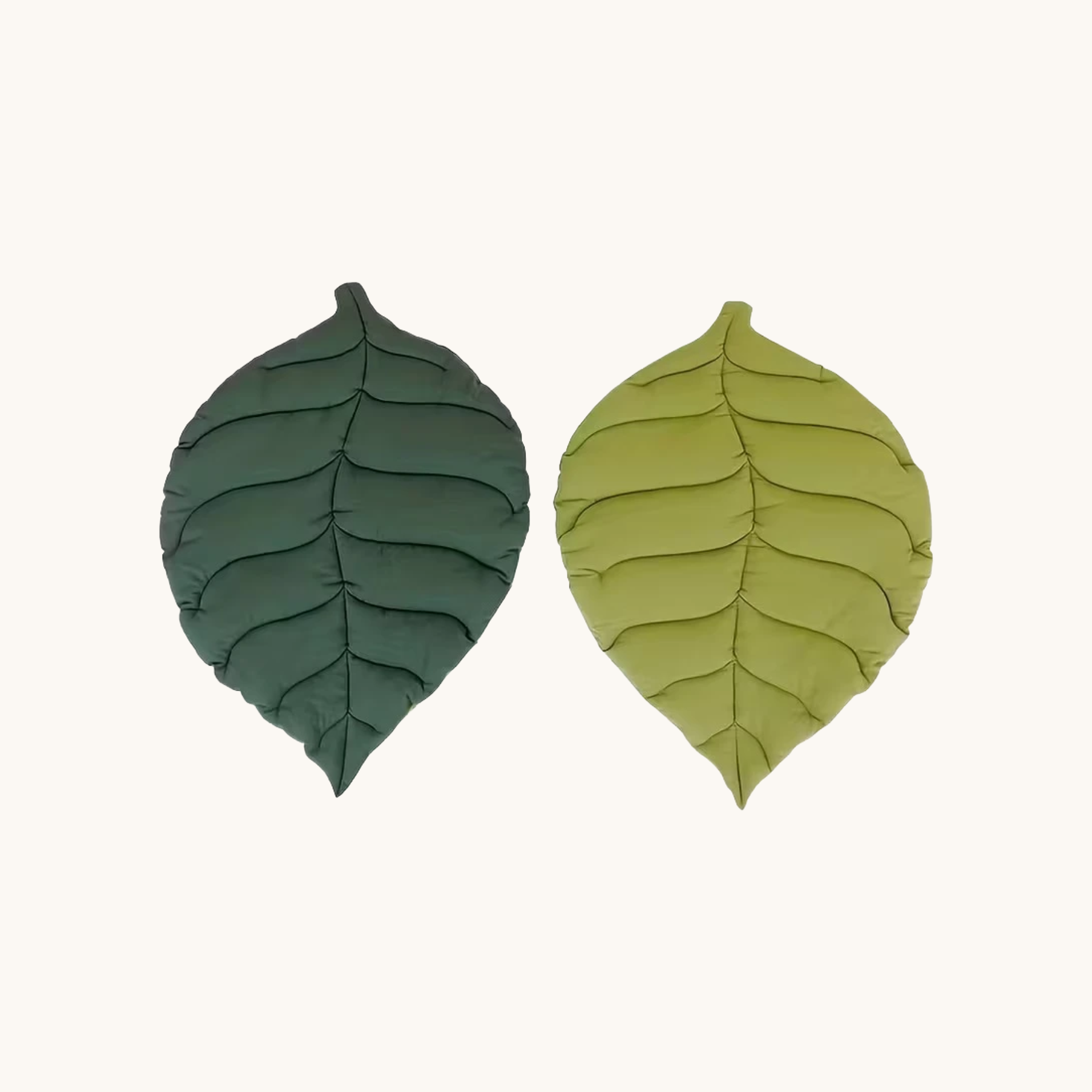 Reversible, two-toned oval leaf-shaped mat.