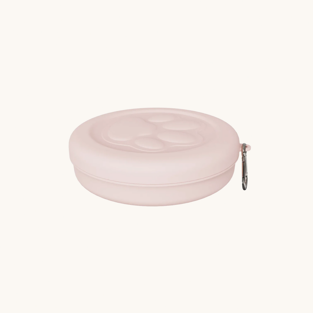 Pink collapsed/folded pet bowl for compact storage