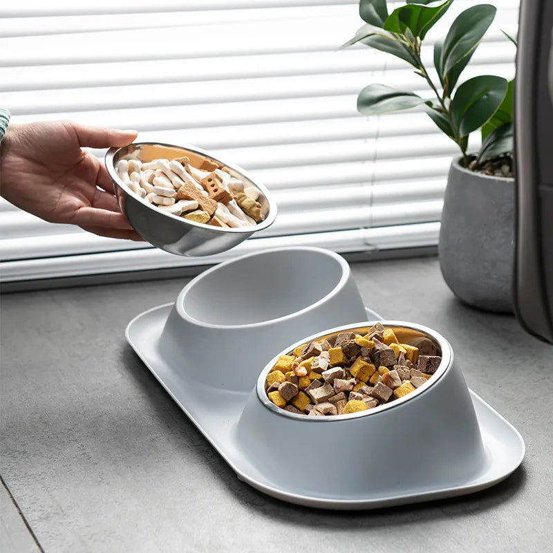 Twin pet bowls with removable stainless steel inserts